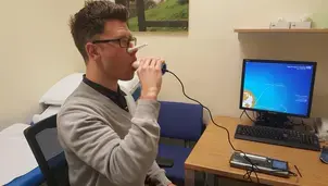Breathing into a sophisticated spirometer